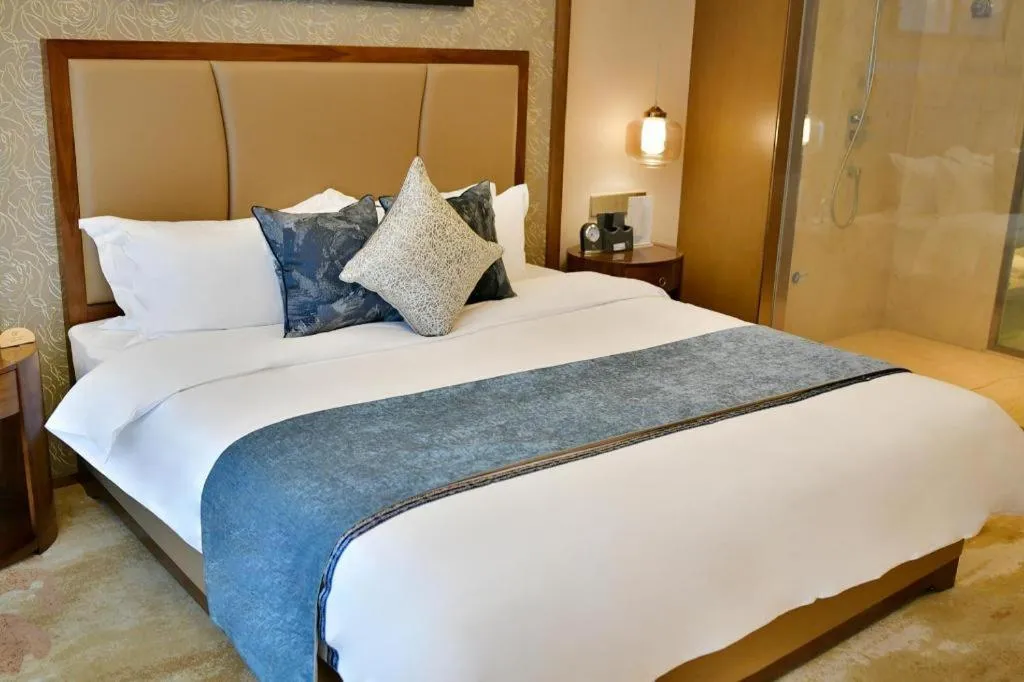 Bed in Qingdao Hualan Hotel