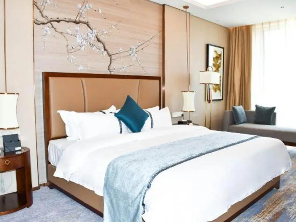 Bed in Qingdao Hualan Hotel