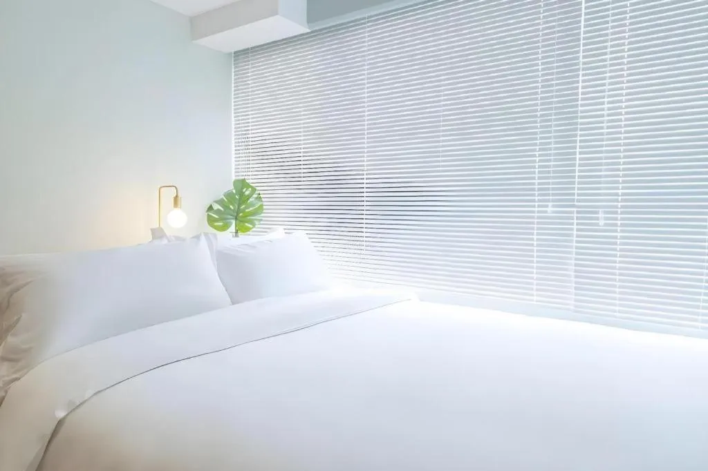 Bed in baseLITE-XINTIANDI Serviced Apartment