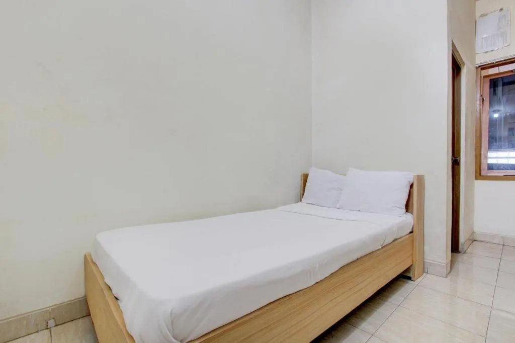 Bed in OYO Life 93662 Kost Pak Budi