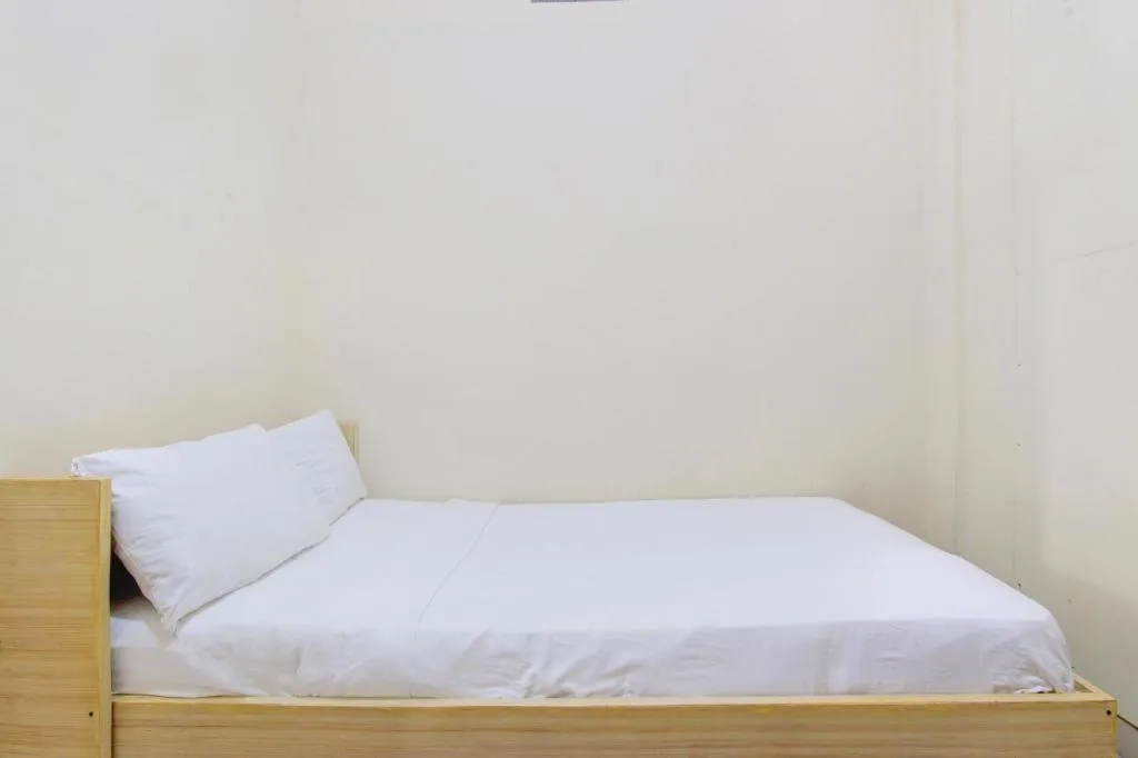 Bed in OYO Life 93662 Kost Pak Budi