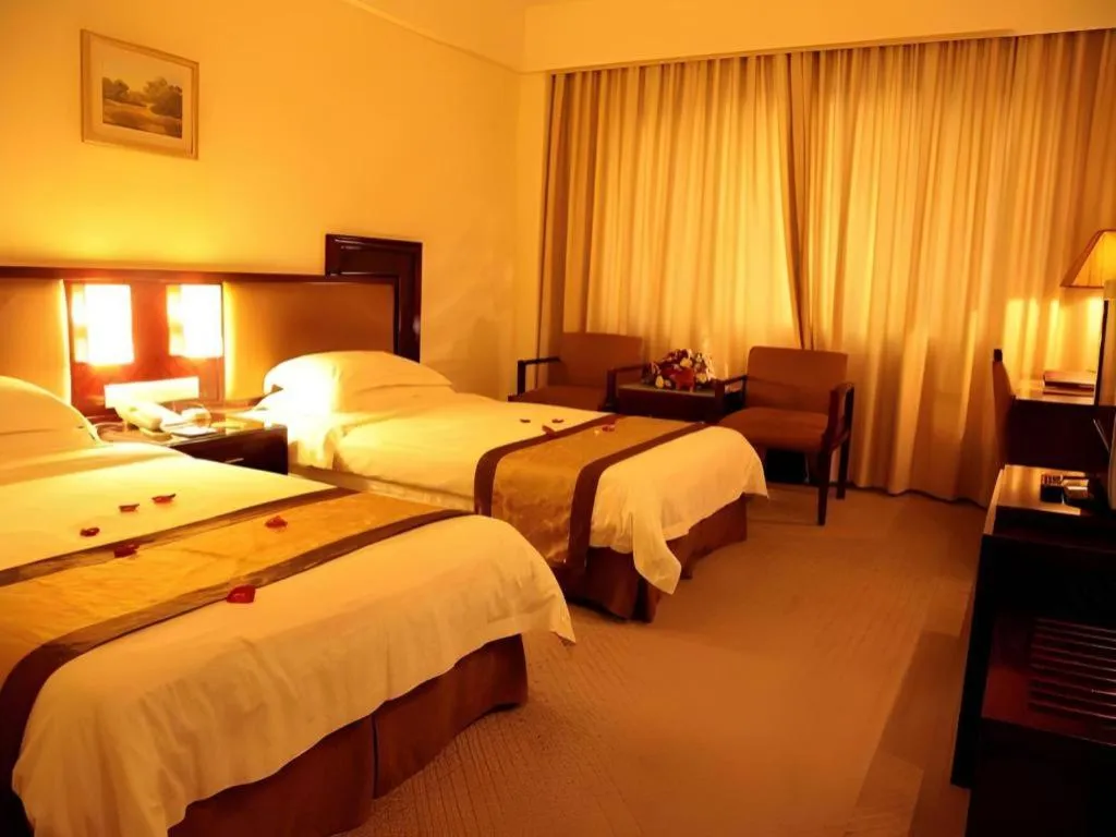 Bed in Hong Ye Hotel