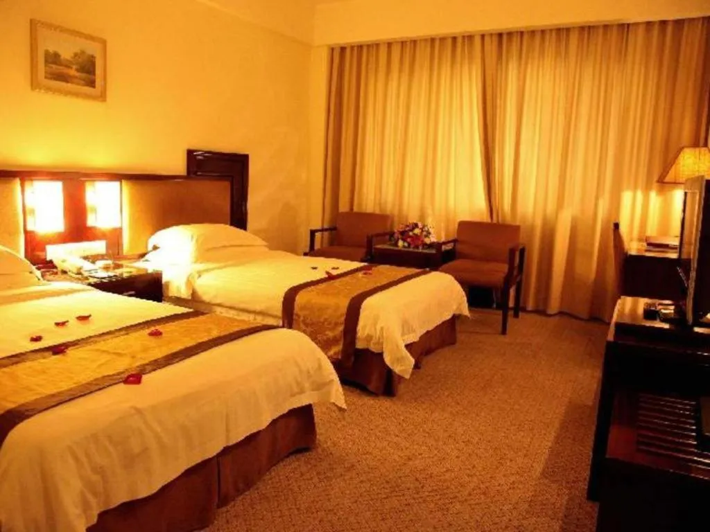 Bed in Hong Ye Hotel