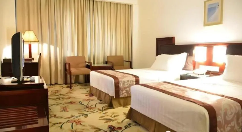 Bed in Hong Ye Hotel