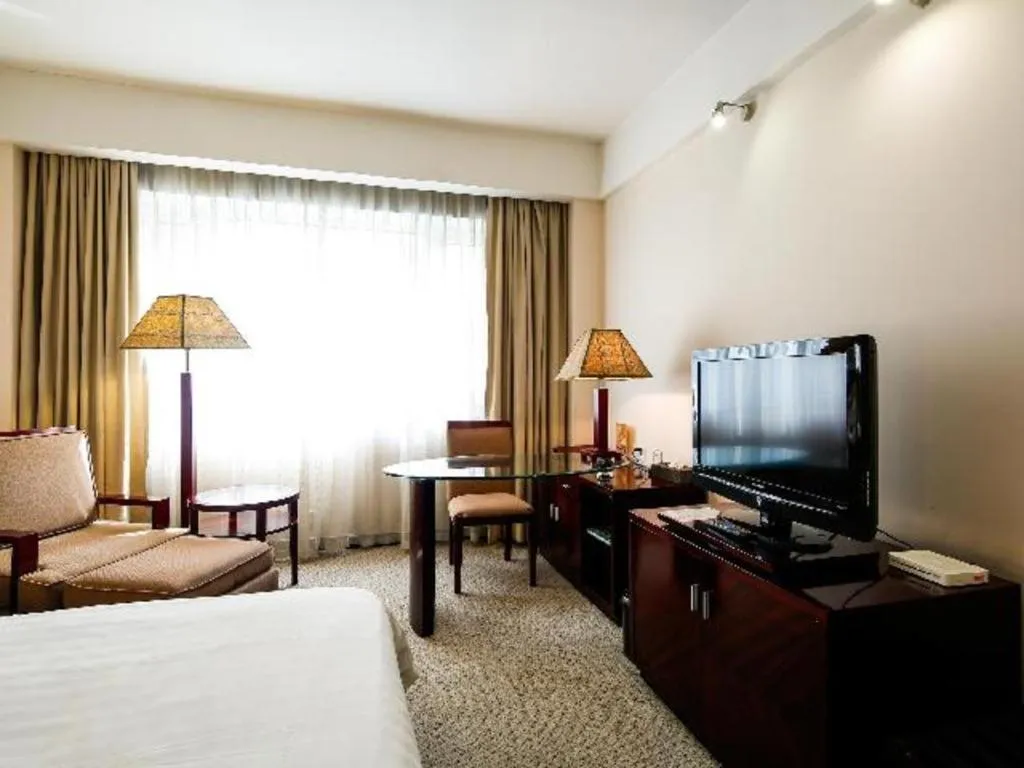 Bed in Hong Ye Hotel