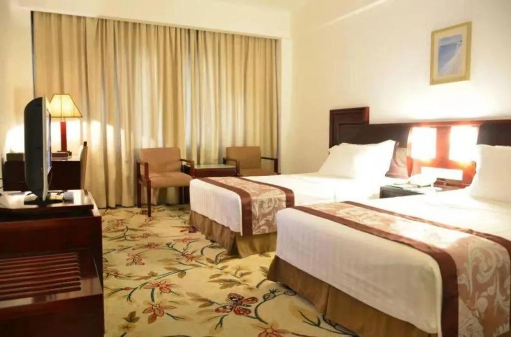 Bed in Hong Ye Hotel