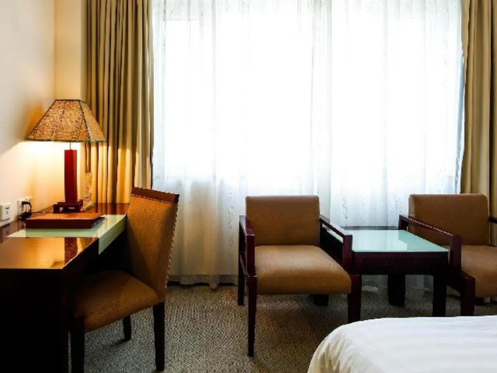 Bed in Hong Ye Hotel