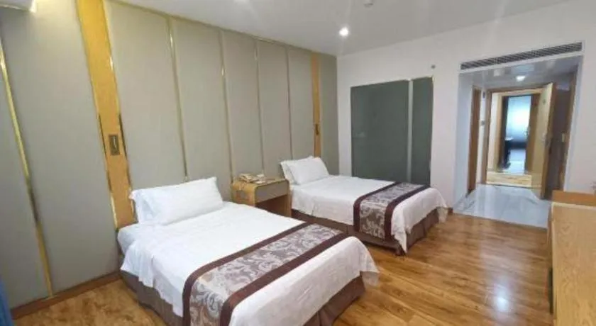 Bed in Hong Ye Hotel