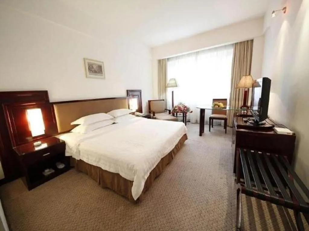 Bed in Hong Ye Hotel