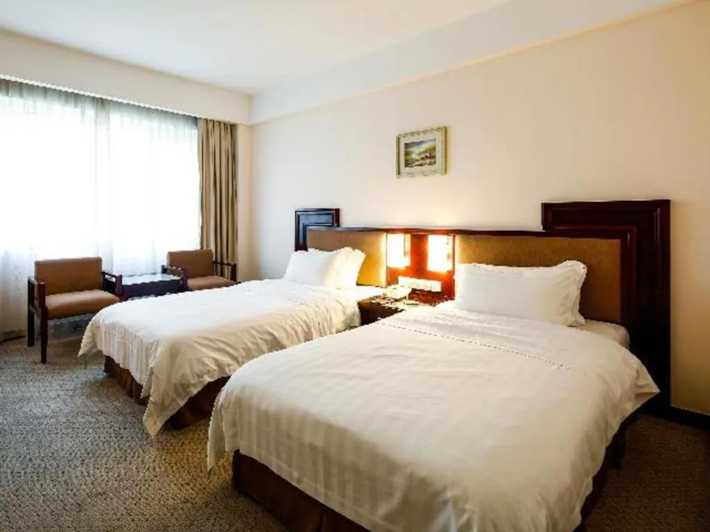 Bed in Hong Ye Hotel