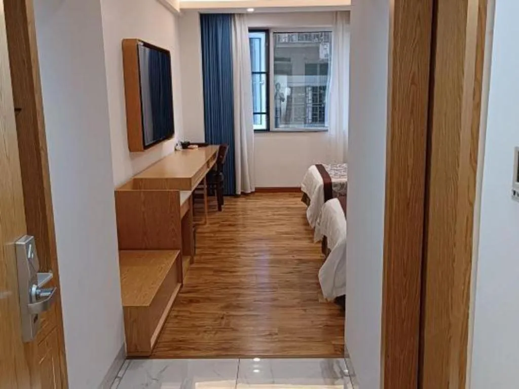 Bed in Hong Ye Hotel