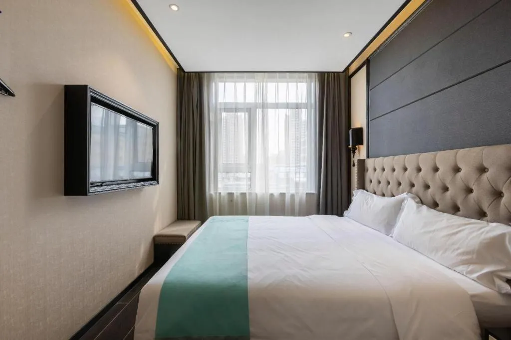 Bed in Xana Hotelle Beijing Fengtai Railway Station Tiantan Hospital