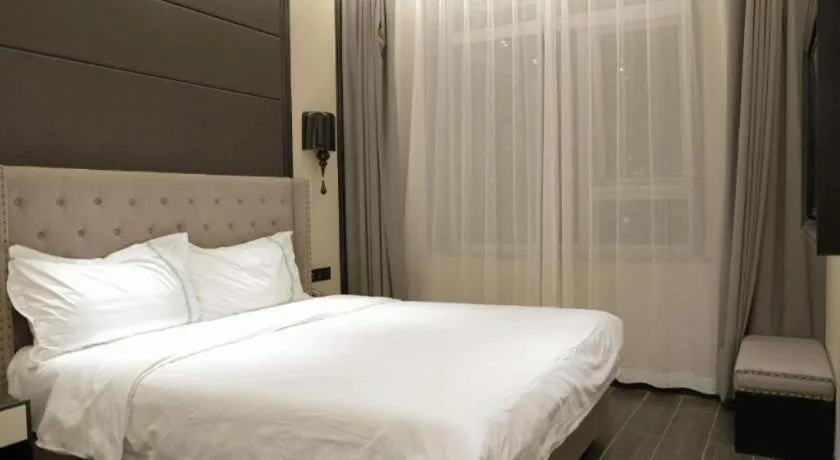 Bed in Xana Hotelle Beijing Fengtai Railway Station Tiantan Hospital