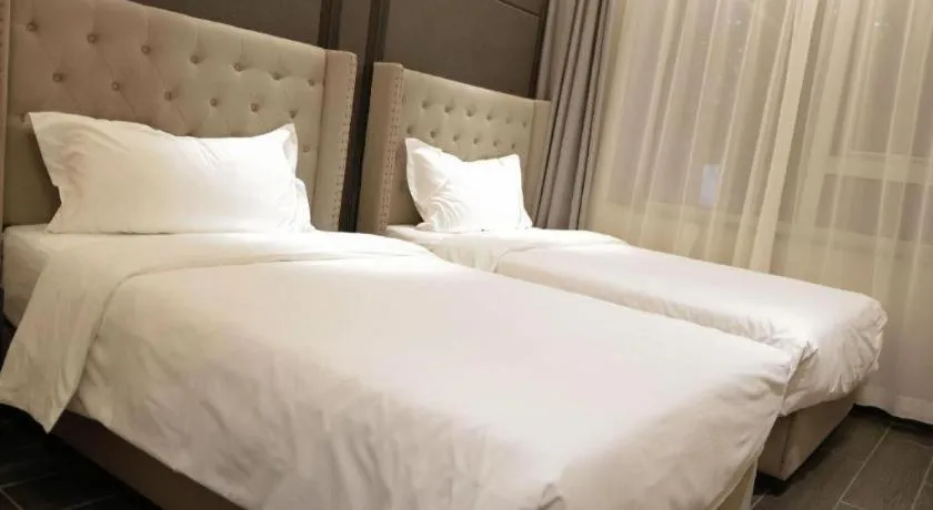 Bed in Xana Hotelle Beijing Fengtai Railway Station Tiantan Hospital