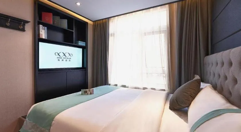 Bed in Xana Hotelle Beijing Fengtai Railway Station Tiantan Hospital