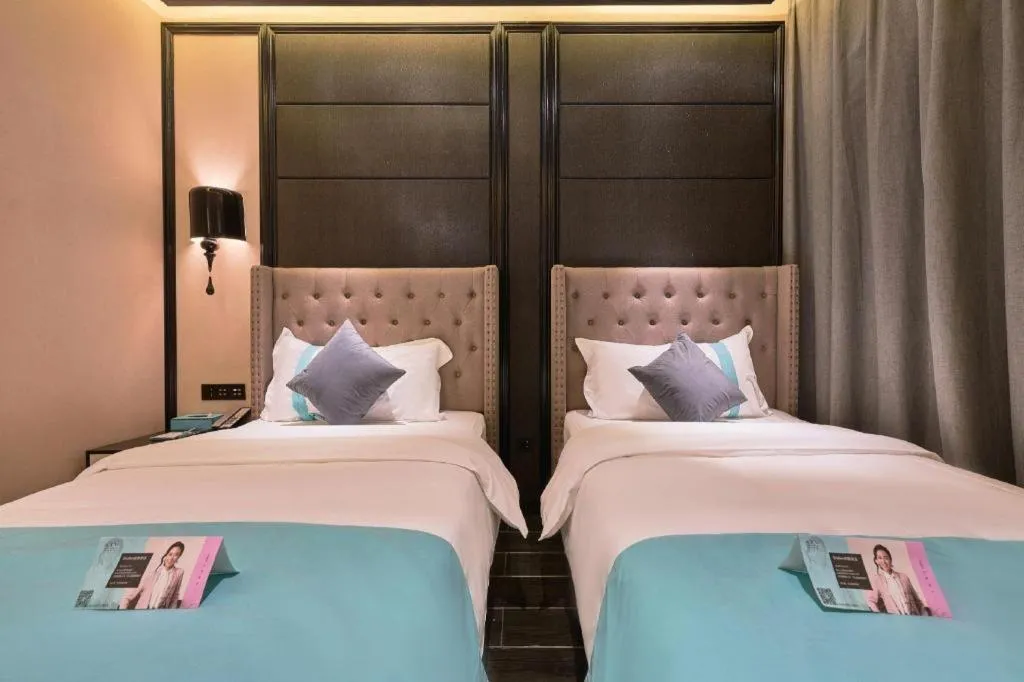 Bed in Xana Hotelle Beijing Fengtai Railway Station Tiantan Hospital