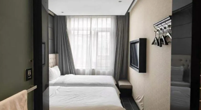 Bed in Xana Hotelle Beijing Fengtai Railway Station Tiantan Hospital