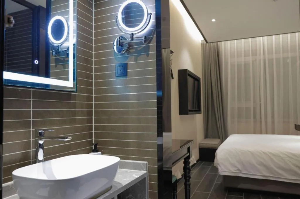 Bed in Xana Hotelle Beijing Fengtai Railway Station Tiantan Hospital