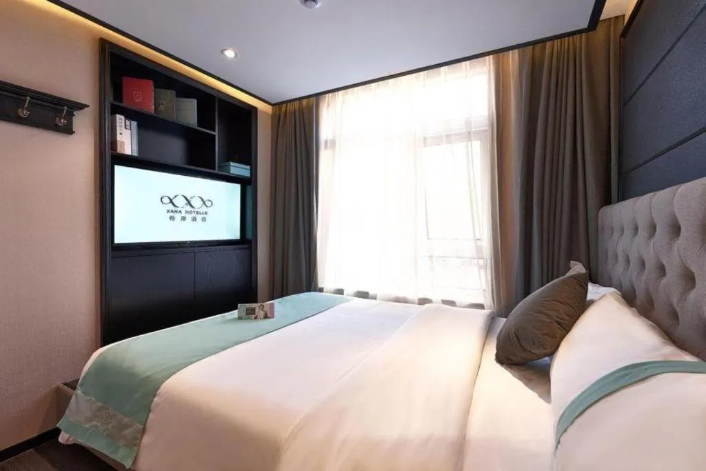 Bed in Xana Hotelle Beijing Fengtai Railway Station Tiantan Hospital