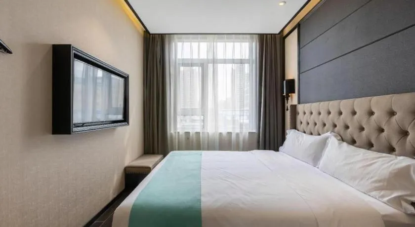 Bed in Xana Hotelle Beijing Fengtai Railway Station Tiantan Hospital