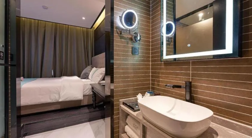 Bed in Xana Hotelle Beijing Fengtai Railway Station Tiantan Hospital