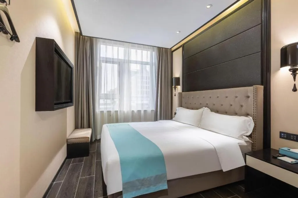 Bed in Xana Hotelle Beijing Fengtai Railway Station Tiantan Hospital