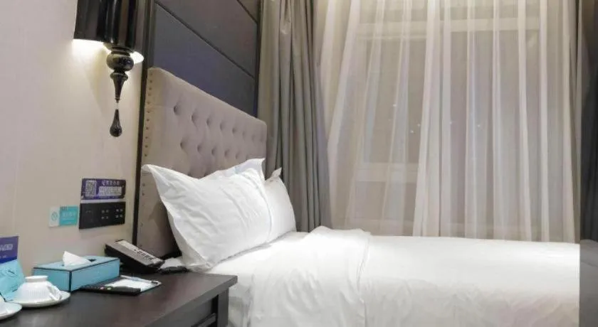 Bed in Xana Hotelle Beijing Fengtai Railway Station Tiantan Hospital
