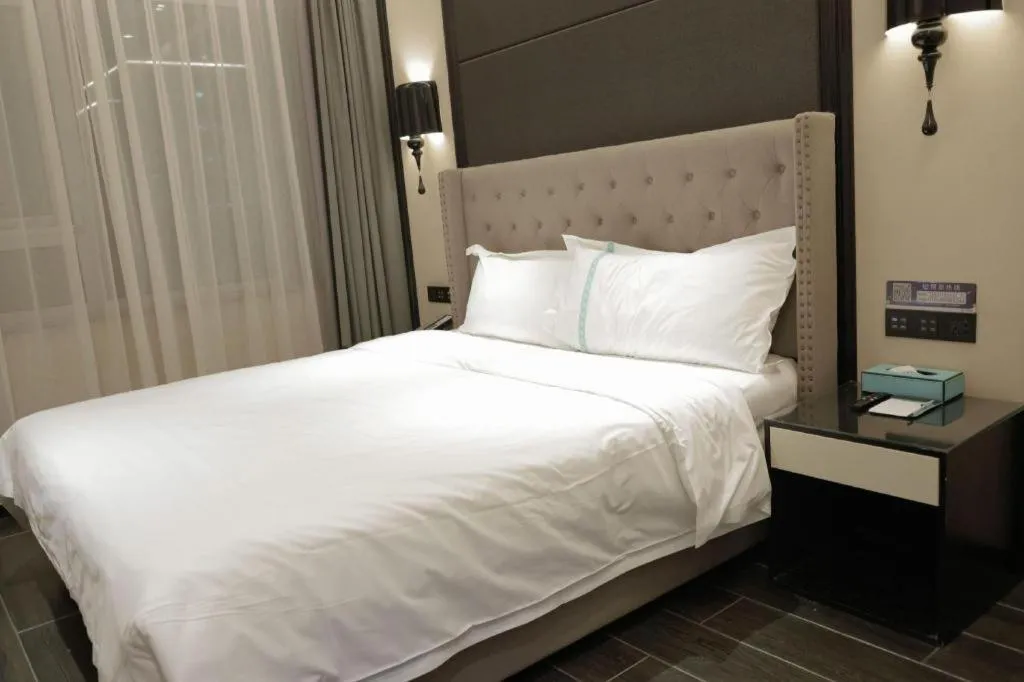 Bed in Xana Hotelle Beijing Fengtai Railway Station Tiantan Hospital