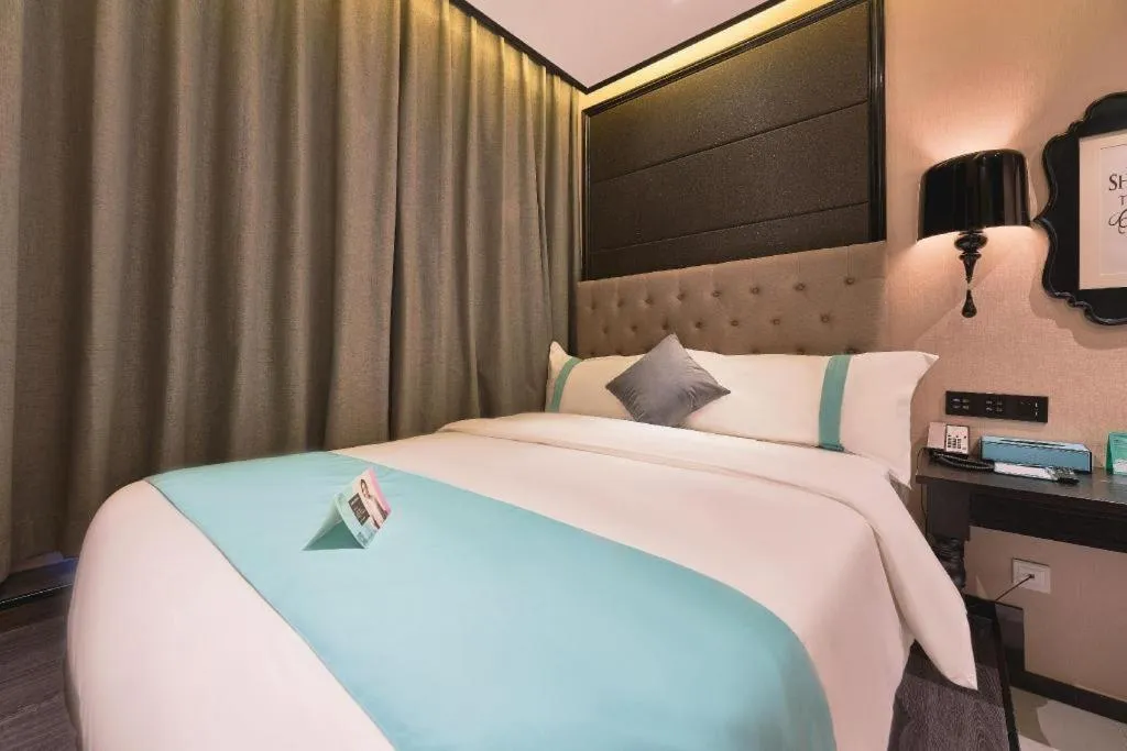 Bed in Xana Hotelle Beijing Fengtai Railway Station Tiantan Hospital