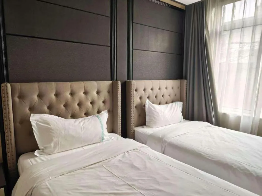 Bed in Xana Hotelle Beijing Fengtai Railway Station Tiantan Hospital