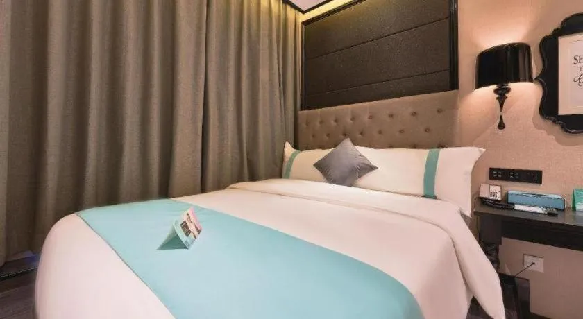 Bed in Xana Hotelle Beijing Fengtai Railway Station Tiantan Hospital