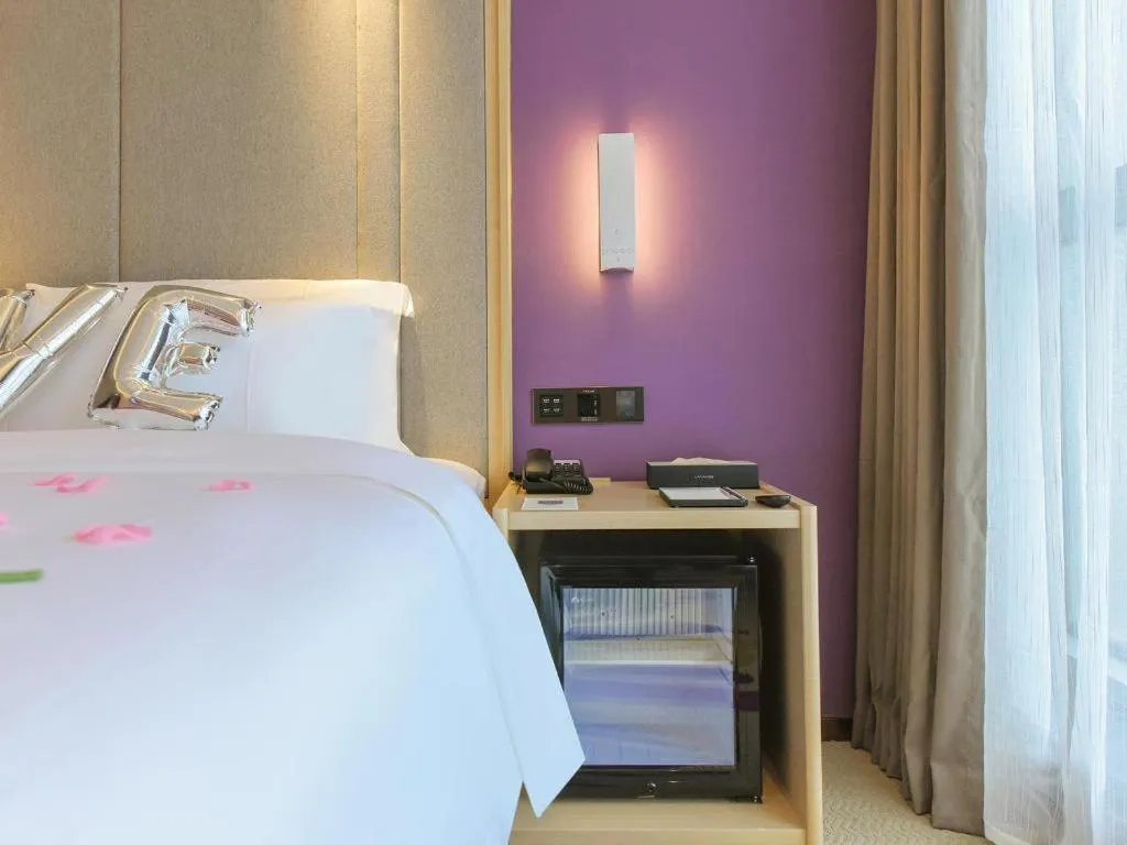 Bed in Lavande Hotel Chongqing Xinghui Liangjiang Happiness Plaza