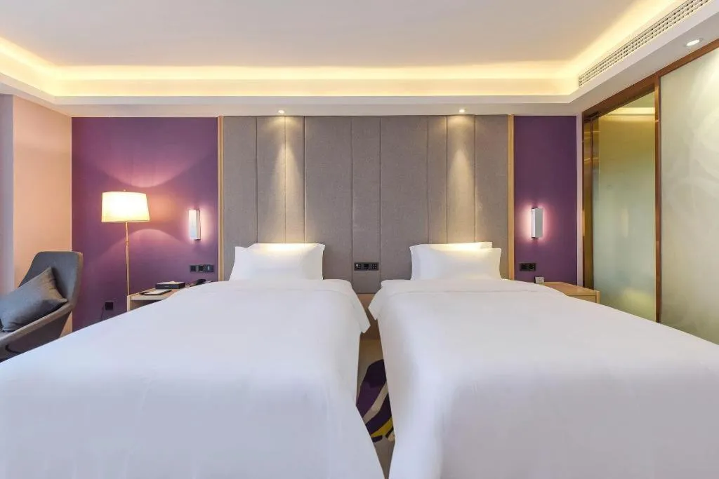 Bed in Lavande Hotel Chongqing Xinghui Liangjiang Happiness Plaza