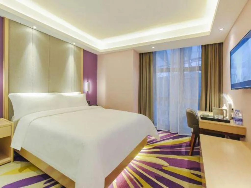 Bed in Lavande Hotel Chongqing Xinghui Liangjiang Happiness Plaza