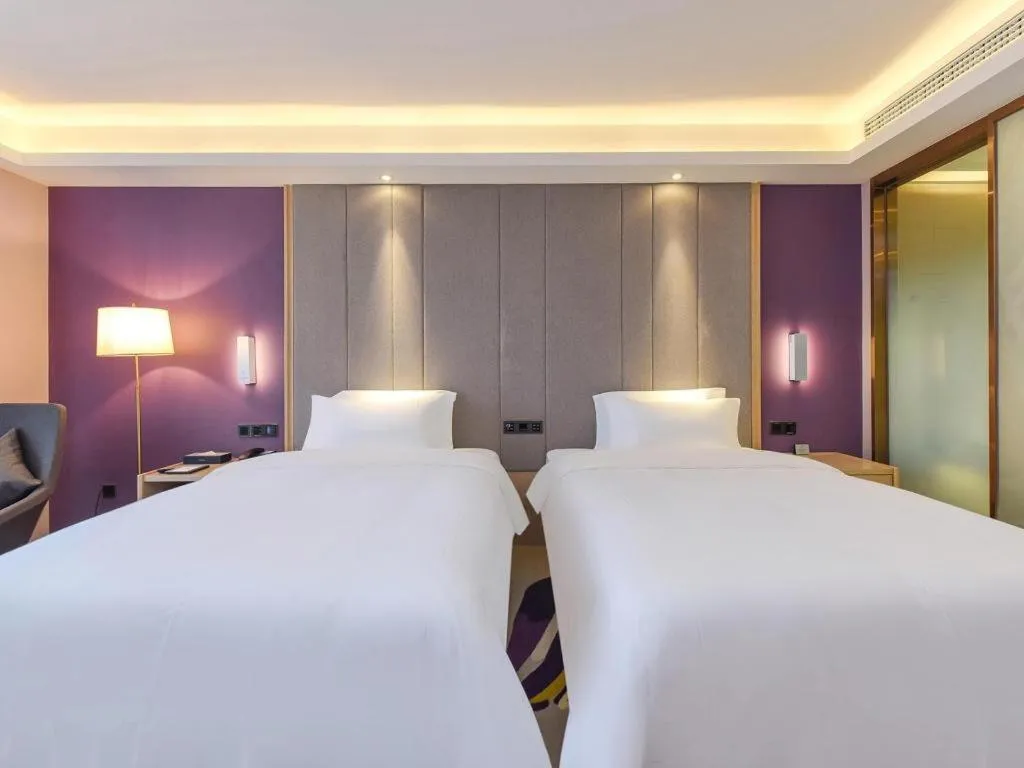 Bed in Lavande Hotel Chongqing Xinghui Liangjiang Happiness Plaza