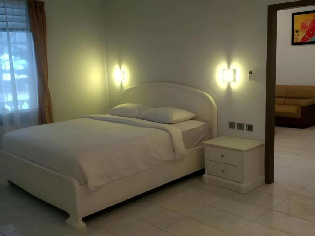 Bed in Toba Beach Hotel