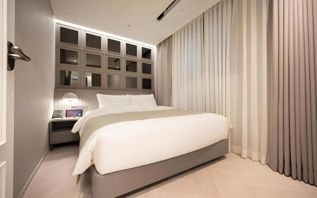 Bed in HOTEL D EDITION