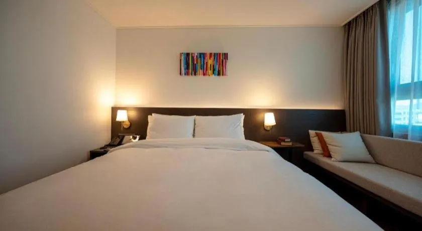 Bed in HOTEL D EDITION