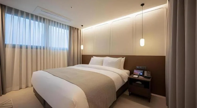 Bed in HOTEL D EDITION