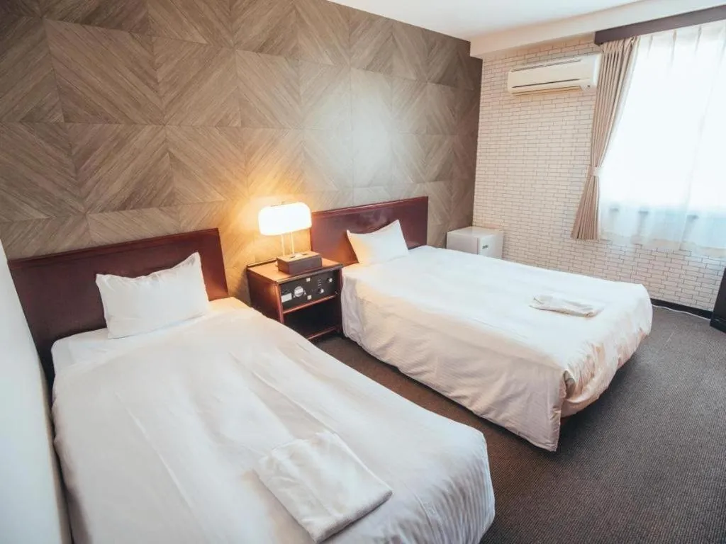 Bed in Hotel Areaone Miyazaki