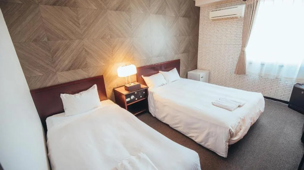 Bed in Hotel Areaone Miyazaki