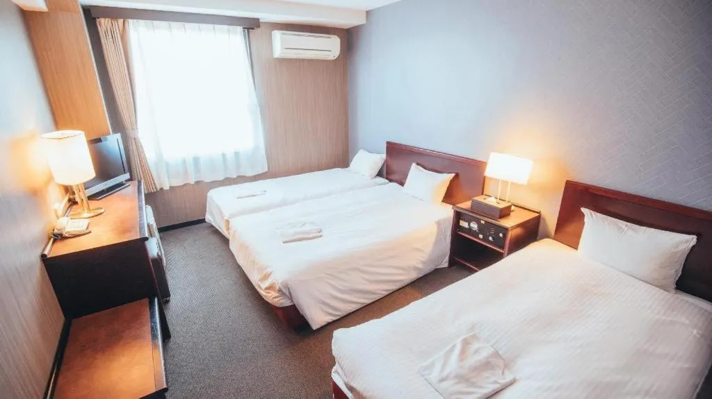 Bed in Hotel Areaone Miyazaki