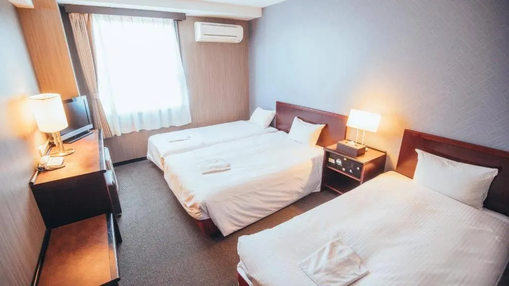 Bed in Hotel Areaone Miyazaki