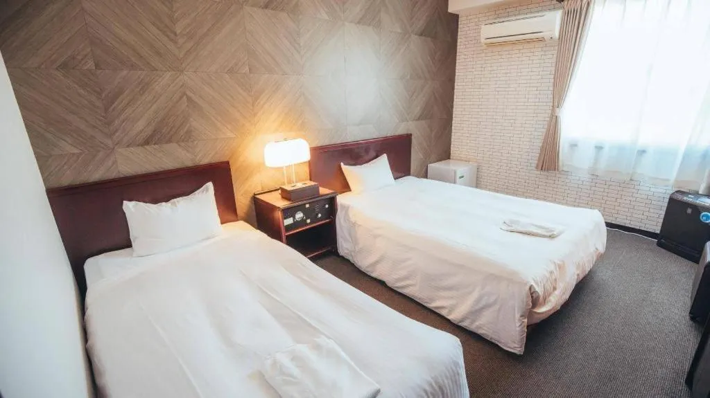 Bed in Hotel Areaone Miyazaki