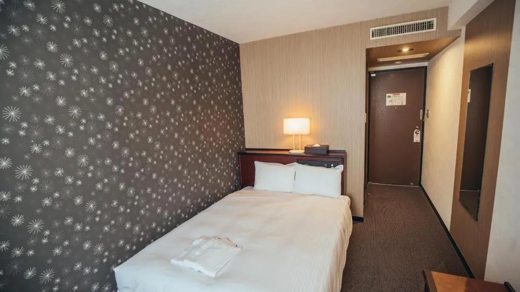 Bed in Hotel Areaone Miyazaki