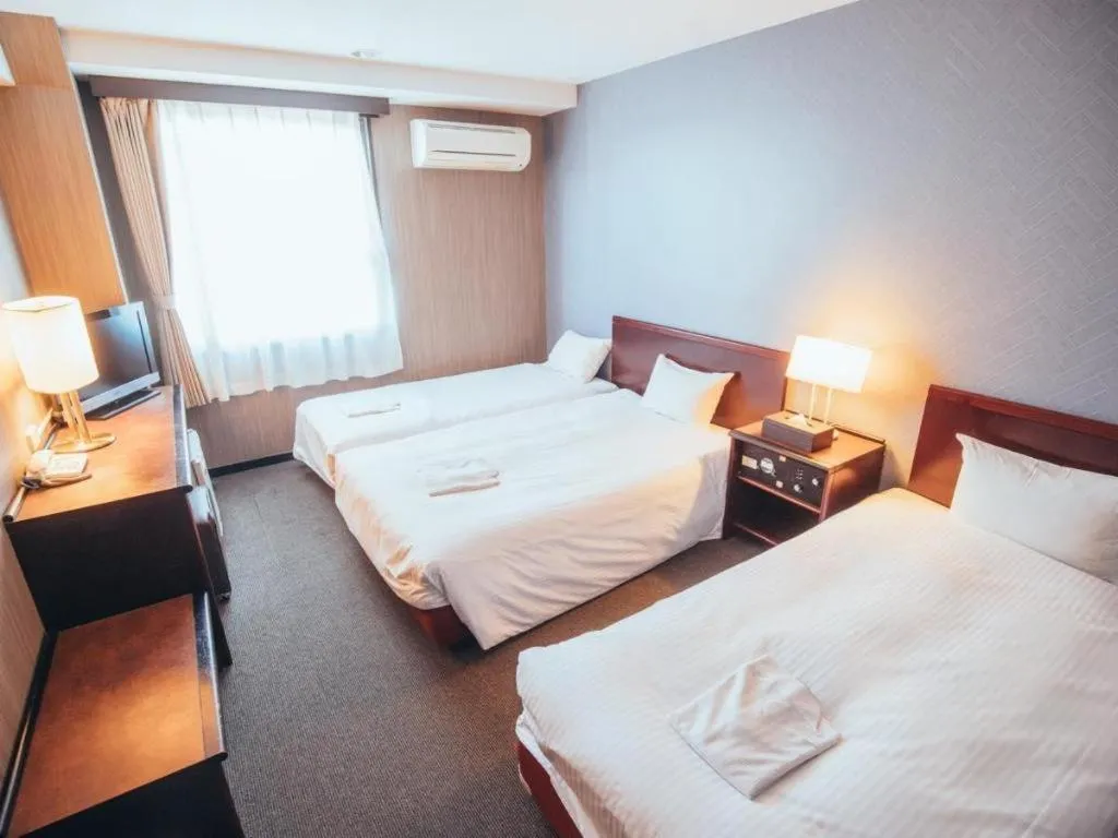 Bed in Hotel Areaone Miyazaki