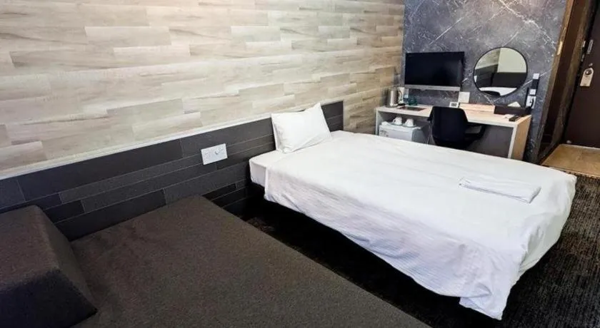 Bed in Hotel Areaone Miyazaki