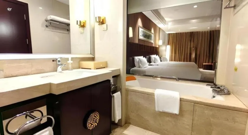 Bed in Xian Grand Soluxe International Hotel