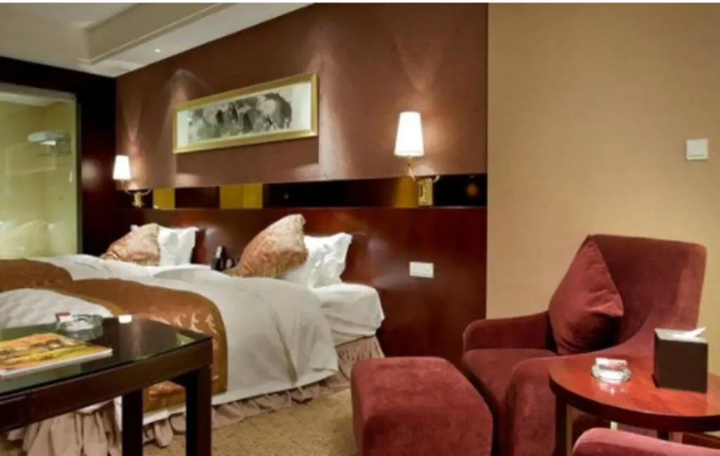 Bed in Xian Grand Soluxe International Hotel