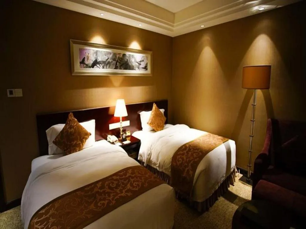 Bed in Xian Grand Soluxe International Hotel